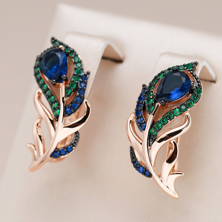 Handmade Peacock Feather Earrings with Shappires